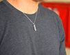 Mezuzah Necklace Pendant in Sterling Silver with Cut Out Hamsa Hand