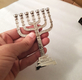 Decorative Seven Branch Mini Menorah with Judaic Symbols, Silver  4.5 or 7