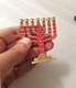 Miniature 7 Branch Menorah with Judaic Symbols, Red and Gold - 2.7 Height