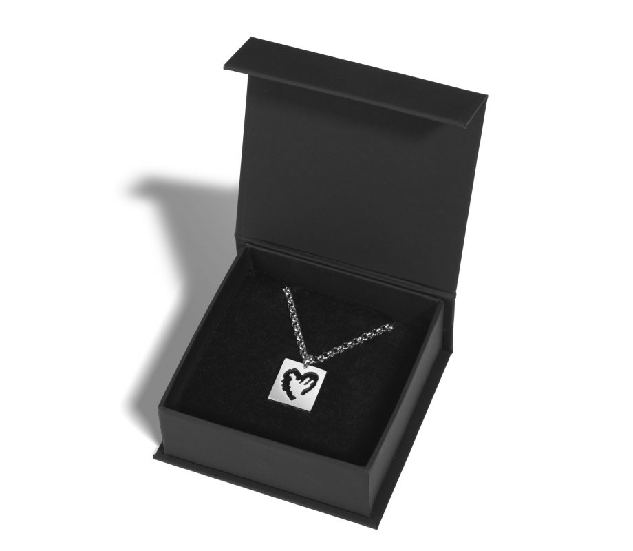Adi Sidler Stainless Steel Necklace – Cutout Heart within a Heart Pendant